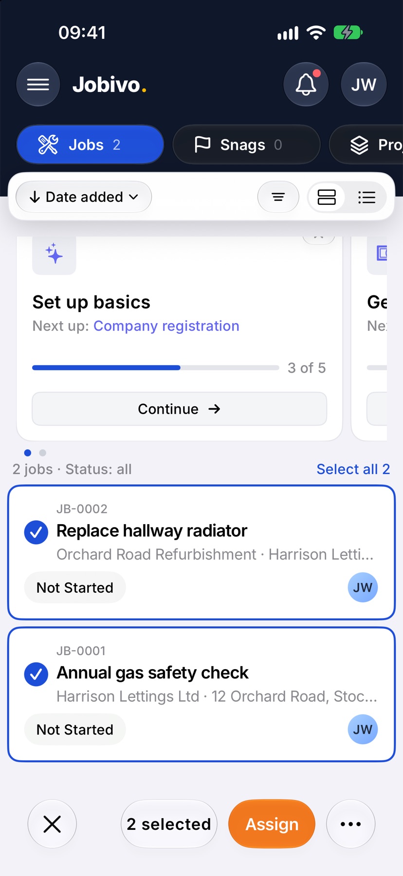 Home in selection mode with two jobs ticked and the bottom bar showing 2 selected and Assign