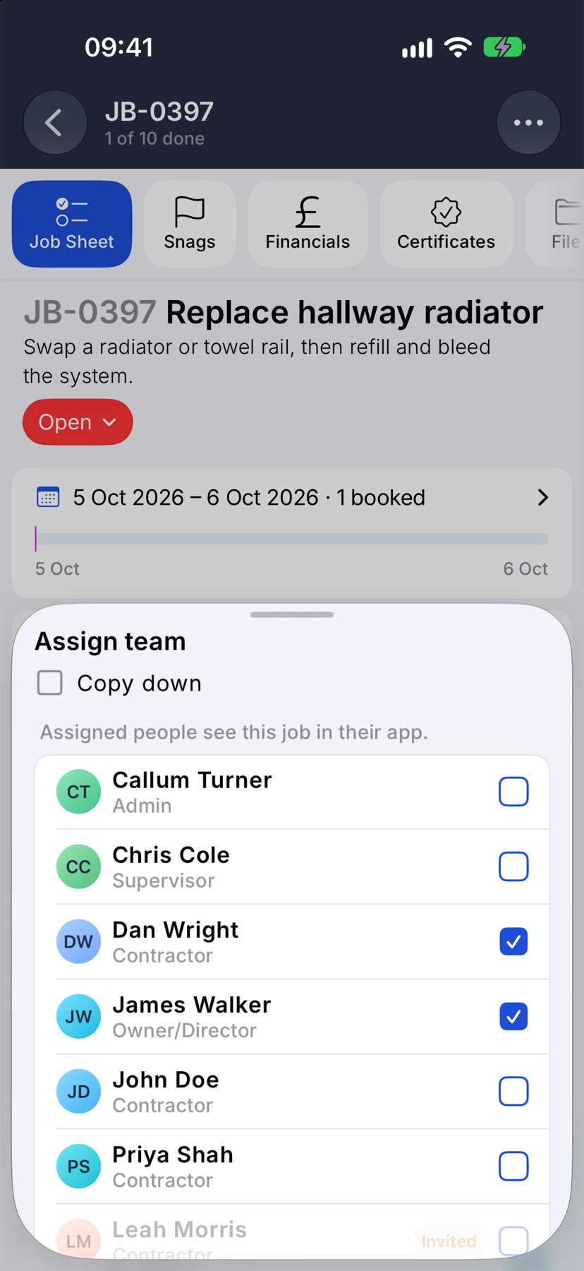 The Assign team sheet with the Copy down tick box and a list of team members, two of them ticked. The list saves each tick as you make it