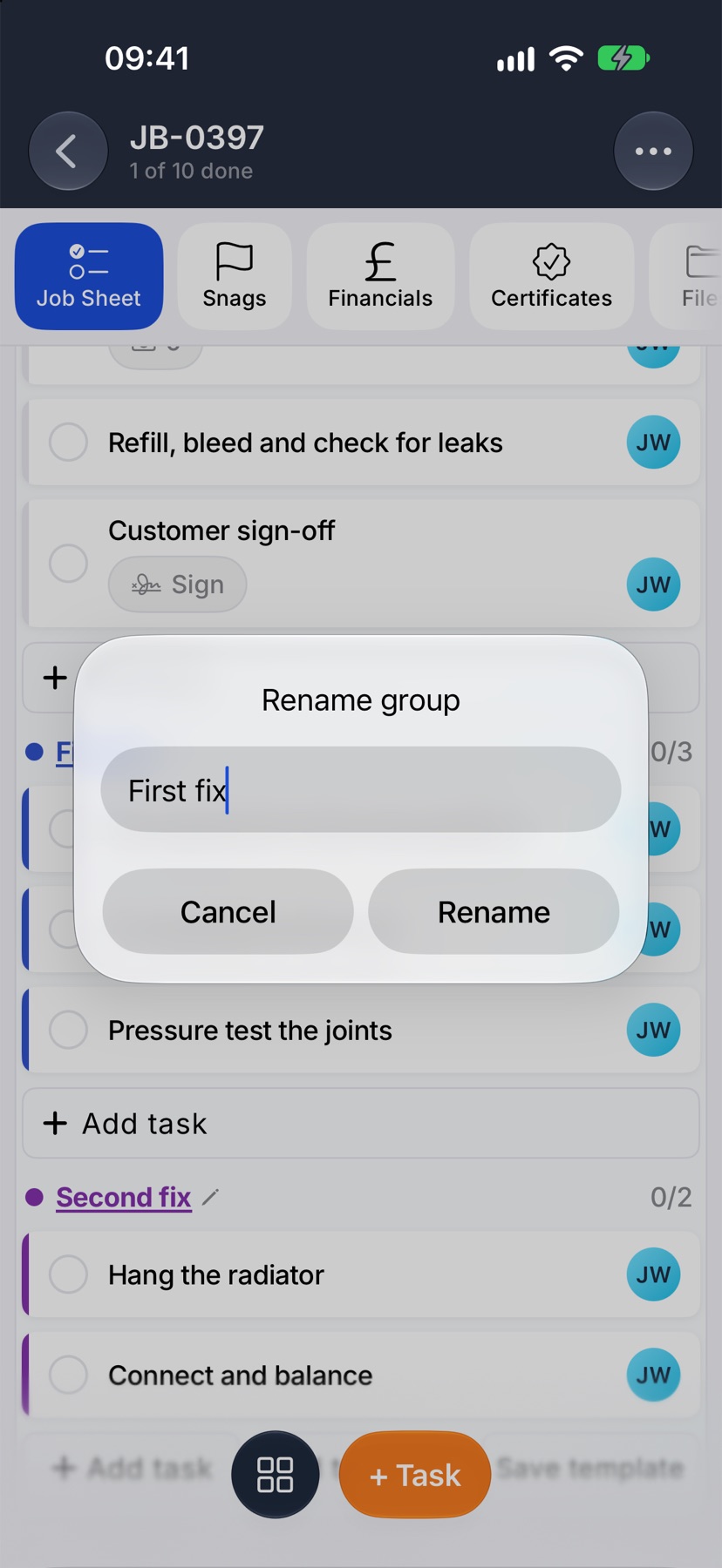 The Rename group prompt over the job sheet with First fix in the Group name field
