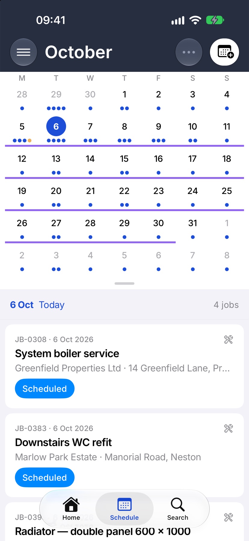 The same screen with the handle dragged down so the full month calendar shows above the list